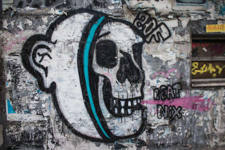 Athens, Greece - November 22, 2021 Street art in Athens, graffiti that covers the whole city, where every alley, shop front, brick wallis an artistic canvas, of political reference or of social satireの写真素材