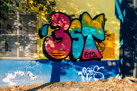 Athens, Greece - November 22, 2021 Street art in Athens, graffiti that covers the whole city, where every alley, shop front, brick wallis an artistic canvas, of political reference or of social satireの写真素材