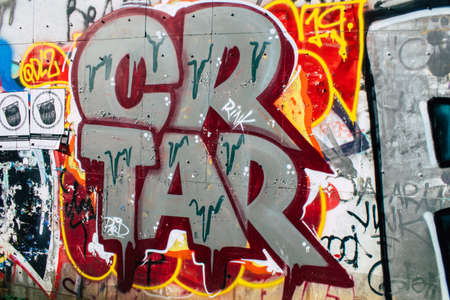 Athens, Greece - November 22, 2021 Street art in Athens, graffiti that covers the whole city, where every alley, shop front, brick wallis an artistic canvas, of political reference or of social satireの写真素材