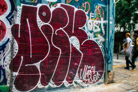 Athens, Greece - November 22, 2021 Street art in Athens, graffiti that covers the whole city, where...