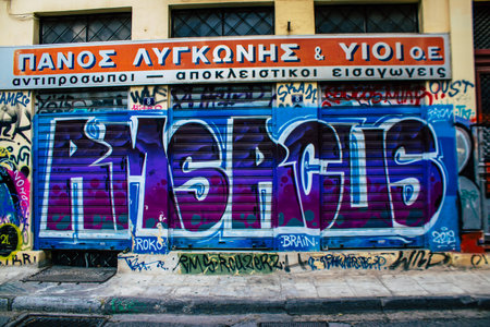 Athens, Greece - November 22, 2021 Street art in Athens, graffiti that covers the whole city, where every alley, shop front, brick wallis an artistic canvas, of political reference or of social satireの写真素材
