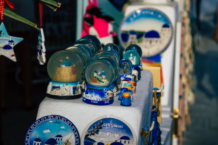 Santorini Island, Fira, Greece - October 23, 2021 Decorative objects, accessories and goods sold to tourists in souvenir shops of Fira, tourist town and capital of Santorini in the Greek Islandsのeditorial素材