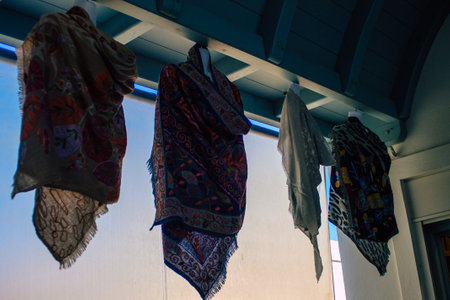 Santorini Island, Fira, Greece - October 23, 2021 Decorative objects, accessories and goods sold to tourists in souvenir shops of Fira, tourist town and capital of Santorini in the Greek Islandsのeditorial素材