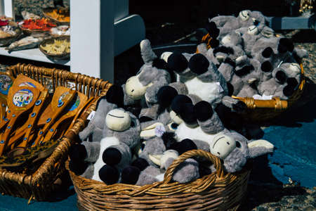 Santorini Island, Fira, Greece - October 23, 2021 Decorative objects, accessories and goods sold to...