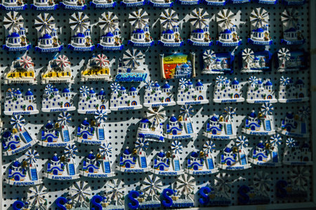 Santorini Island, Fira, Greece - October 23, 2021 Decorative objects, accessories and goods sold to tourists in souvenir shops of Fira, tourist town and capital of Santorini in the Greek Islandsのeditorial素材