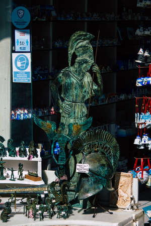 Santorini Island, Fira, Greece - October 23, 2021 Decorative objects, accessories and goods sold to...
