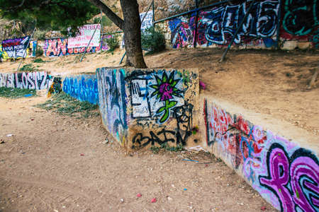 Athens, Greece - November 20, 2021 StrÃ©fi Hill is an urban nature park covered in tags and...
