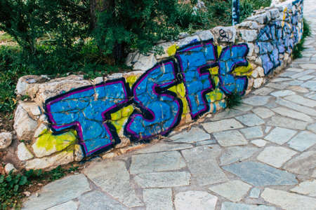 Athens, Greece - November 20, 2021 StrÃ©fi Hill is an urban nature park covered in tags and messages made by anarchist artists, located in the district of Exarcheia, considered the rebel area of Athensのeditorial素材