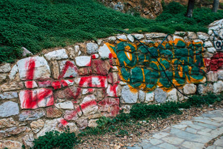Athens, Greece - November 20, 2021 StrÃ©fi Hill is an urban nature park covered in tags and messages made by anarchist artists, located in the district of Exarcheia, considered the rebel area of Athensのeditorial素材