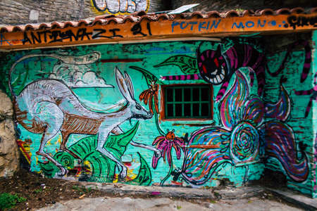 Athens, Greece - November 20, 2021 StrÃ©fi Hill is an urban nature park covered in tags and messages made by anarchist artists, located in the district of Exarcheia, considered the rebel area of Athensのeditorial素材