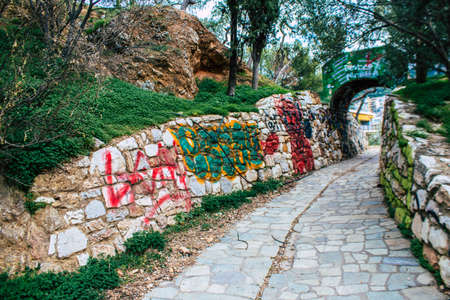 Athens, Greece - November 20, 2021 StrÃ©fi Hill is an urban nature park covered in tags and messages made by anarchist artists, located in the district of Exarcheia, considered the rebel area of Athensのeditorial素材