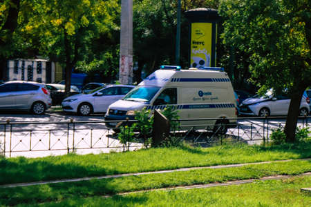 Athens, Greece - November 20, 2021 Greek ambulance driving through the streets of Athens during the...