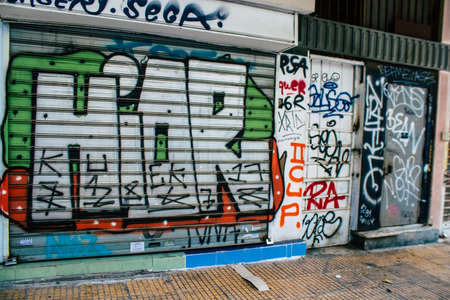 Athens, Greece - November 22, 2021 Street art in Athens, graffiti that covers the whole city, where every alley, shop front, brick wallis an artistic canvas, of political reference or of social satireのeditorial素材