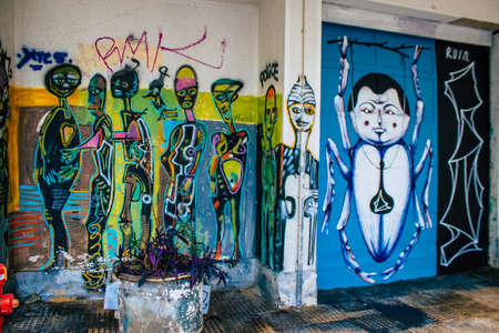 Athens, Greece - November 22, 2021 Street art in Athens, graffiti that covers the whole city, where...