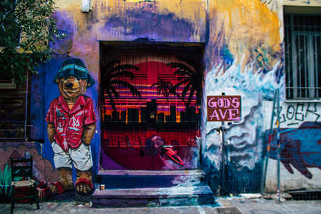 Athens, Greece - November 22, 2021 Street art in Athens, graffiti that covers the whole city, where...