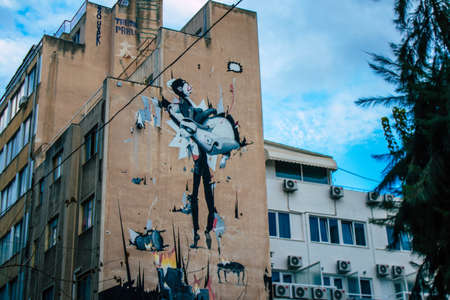 Athens, Greece - November 22, 2021 Street art in Athens, graffiti that covers the whole city, where every alley, shop front, brick wallis an artistic canvas, of political reference or of social satireのeditorial素材
