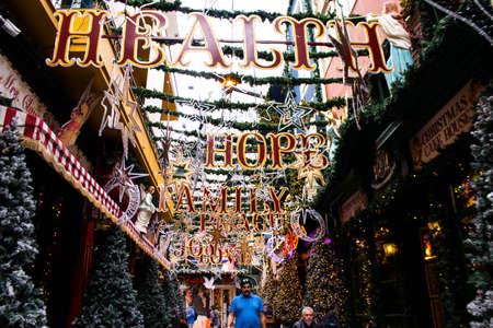 Athens, Greece - November 22, 2021 Traditional christmas decorations in the streets of Athens during the coronavirus outbreak hitting Greece, wearing a mask is not mandatoryのeditorial素材
