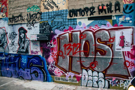 Athens, Greece - November 22, 2021 Street art in Athens, graffiti that covers the whole city, where every alley, shop front, brick wallis an artistic canvas, of political reference or of social satireのeditorial素材