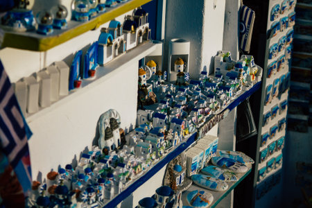 Santorini Island, Fira, Greece - October 23, 2021 Decorative objects, accessories and goods sold to tourists in souvenir shops of Fira, tourist town and capital of Santorini in the Greek Islandsのeditorial素材