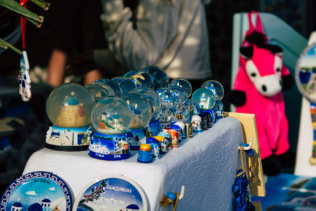 Santorini Island, Fira, Greece - October 23, 2021 Decorative objects, accessories and goods sold to tourists in souvenir shops of Fira, tourist town and capital of Santorini in the Greek Islandsのeditorial素材