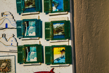 Santorini Island, Fira, Greece - October 23, 2021 Decorative objects, accessories and goods sold to tourists in souvenir shops of Fira, tourist town and capital of Santorini in the Greek Islandsのeditorial素材