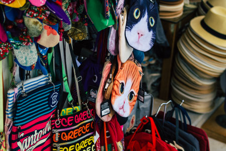 Santorini Island, Fira, Greece - October 23, 2021 Decorative objects, accessories and goods sold to tourists in souvenir shops of Fira, tourist town and capital of Santorini in the Greek Islandsのeditorial素材