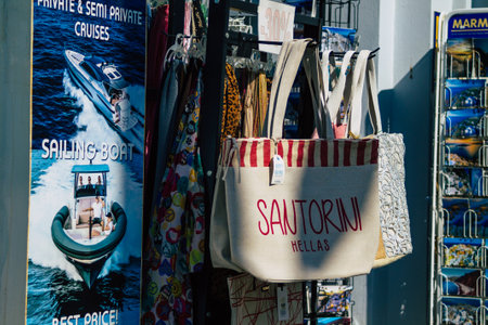 Santorini Island, Fira, Greece - October 23, 2021 Decorative objects, accessories and goods sold to tourists in souvenir shops of Fira, tourist town and capital of Santorini in the Greek Islandsのeditorial素材