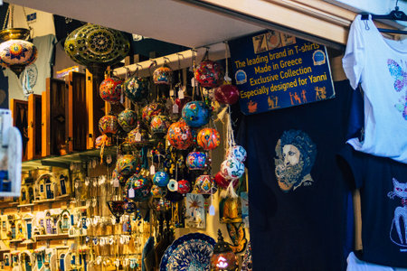 Santorini Island, Fira, Greece - October 23, 2021 Decorative objects, accessories and goods sold to tourists in souvenir shops of Fira, tourist town and capital of Santorini in the Greek Islandsのeditorial素材