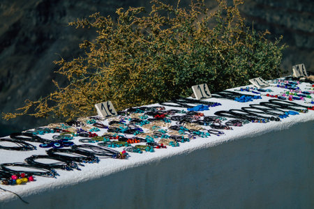 Santorini Island, Fira, Greece - October 23, 2021 Decorative objects, accessories and goods sold to tourists in souvenir shops of Fira, tourist town and capital of Santorini in the Greek Islandsのeditorial素材