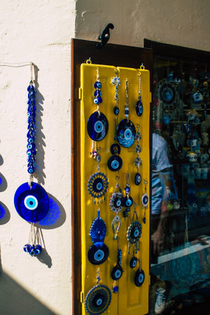 Santorini Island, Fira, Greece - October 23, 2021 Decorative objects, accessories and goods sold to tourists in souvenir shops of Fira, tourist town and capital of Santorini in the Greek Islandsのeditorial素材
