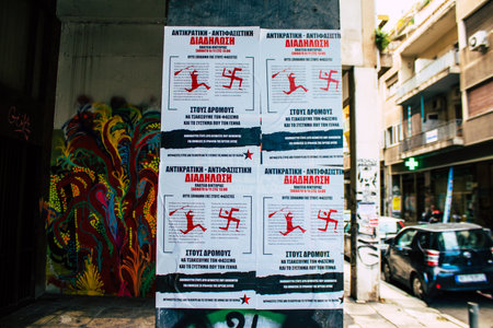Athens, Greece - November 20, 2021 Antifa poster in Exarchia district, considered the rebel zone of Athens, it is famous for being a district of anarchist protest and solidarityのeditorial素材