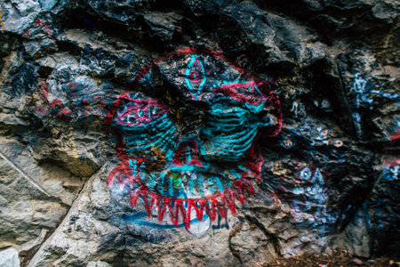 Athens, Greece - November 20, 2021 StrÃ©fi Hill is an urban nature park covered in tags and messages made by anarchist artists, located in the district of Exarcheia, considered the rebel area of Athensのeditorial素材