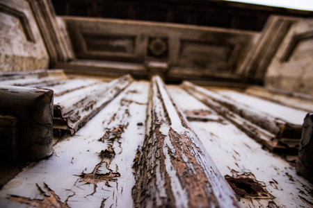 Limassol, Cyprus - December 03, 2021 Detailed close-up of an old door totally damaged by the weather of an old house in the old district of Limassol in Cyprusの写真素材