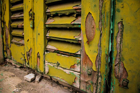 Limassol, Cyprus - December 03, 2021 Detailed close-up of an old window totally damaged by the weather of an old house in the old district of Limassol in Cyprusの写真素材