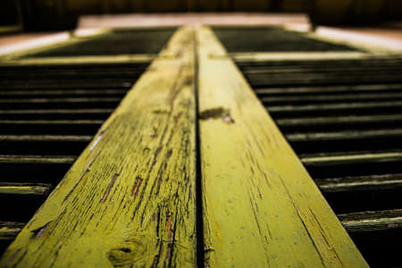 Limassol, Cyprus - December 03, 2021 Detailed close-up of an old window totally damaged by the weather of an old house in the old district of Limassol in Cyprusの写真素材