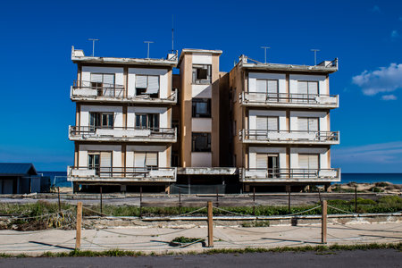 Varosha, Northern Cyprus - January 06, 2022 Cityscape of Varosha, a seaside resort built in 1972, which became a ghost town abandoned by its inhabitants after the Turkish military intervention in 1974のeditorial素材