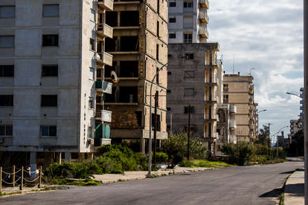 Varosha, Northern Cyprus - January 06, 2022 Cityscape of Varosha, a seaside resort built in 1972, which became a ghost town abandoned by its inhabitants after the Turkish military intervention in 1974のeditorial素材