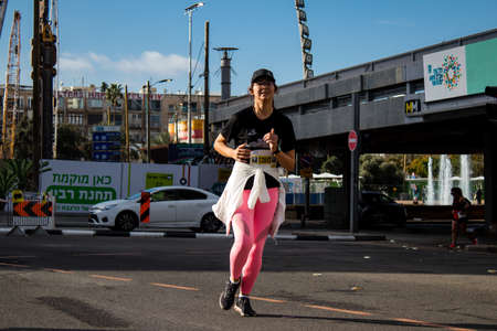 Tel Aviv, Israel - February 25, 2022 Runners in the street of Tel Aviv at the Samsung Marathon which...