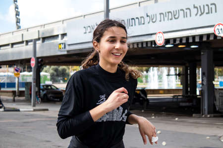 Tel Aviv, Israel - February 25, 2022 Runners in the street of Tel Aviv at the Samsung Marathon which takes place on February 25 after a year-long hiatus following the coronavirus outbreak in Israelのeditorial素材