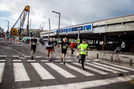 Tel Aviv, Israel - February 25, 2022 Runners in the street of Tel Aviv at the Samsung Marathon which takes place on February 25 after a year-long hiatus following the coronavirus outbreak in Israelのeditorial素材