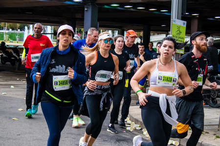 Tel Aviv, Israel - February 25, 2022 Runners in the street of Tel Aviv at the Samsung Marathon which...