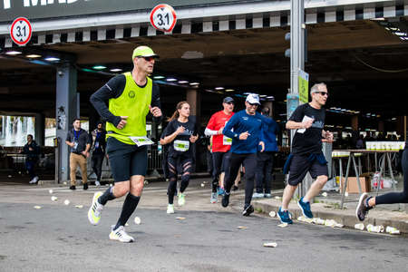 Tel Aviv, Israel - February 25, 2022 Runners in the street of Tel Aviv at the Samsung Marathon which takes place on February 25 after a year-long hiatus following the coronavirus outbreak in Israelのeditorial素材