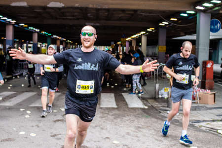 Tel Aviv, Israel - February 25, 2022 Runners in the street of Tel Aviv at the Marathon which takes...