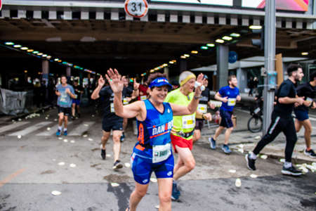 Tel Aviv, Israel - February 25, 2022 Runners in the street of Tel Aviv at the Marathon which takes...