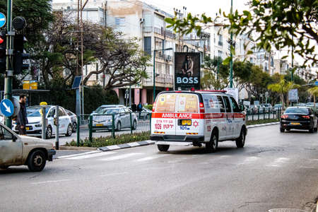 Tel Aviv, Israel - March 08, 2022 Ambulance driving through the streets of Tel Aviv during the coronavirus outbreak hitting Israelのeditorial素材