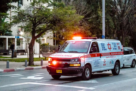 Tel Aviv, Israel - March 08, 2022 Ambulance driving through the streets of Tel Aviv during the coronavirus outbreak hitting Israelのeditorial素材