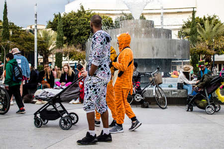 Tel Aviv, Israel - March 18, 2022 Israeli people at Dizengoff square dressed with costumes for the...