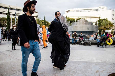 Tel Aviv, Israel - March 18, 2022 Israeli people at Dizengoff square dressed with costumes for the Purim carnival celebration which takes place on March in Israel, Purim festival is a Jewish traditionのeditorial素材