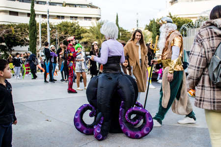 Tel Aviv, Israel - March 18, 2022 Israeli people at Dizengoff square dressed with costumes for the Purim carnival celebration which takes place on March in Israel, Purim festival is a Jewish traditionのeditorial素材