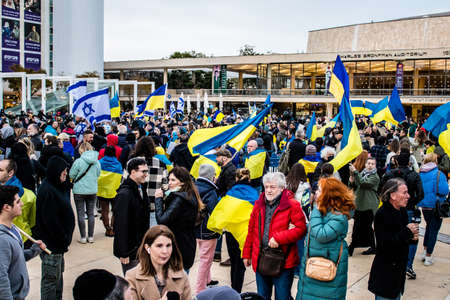Tel Aviv, Israel - March 20, 2022 Protesters against Russian policy towards Ukraine in Habima Square...